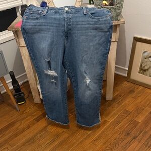 Distressed Blue Women's Levi boyfriend jeans. 22w